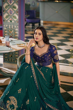 Rangoli silk green and blue contrasting lehenga
