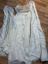 Elegant Ivory Drape Saree with Embellished Blouse & Cape