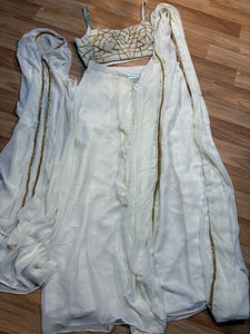 Elegant Ivory Drape Saree with Embellished Blouse & Cape