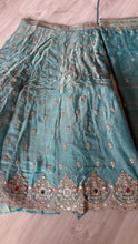 Blue and gold zari silk lehenga