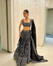 Black threadwork and sequins partywear Lehenga