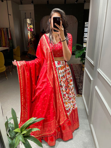 Red Dola silk and patola print Lehengas