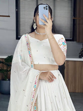 Elegance meets class in off white Lehenga (skirt stitched)