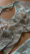 Icy blue lehenga with champagne gold work
