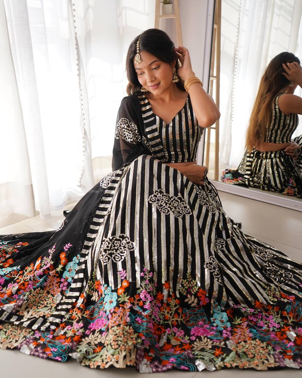 Black, silver sequins and multi florals