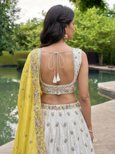 White and yellow chiffon embroidered Lehenga
