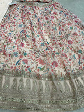 Tinge of cream and pink organza floral Lehenga