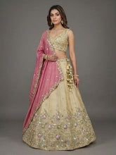 Beige and contrasting pink dupatta lehenga