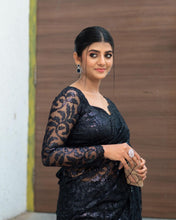 Black sequinned saree with long sleeves blouse