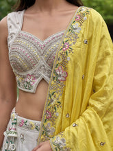 White and yellow chiffon embroidered Lehenga