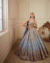 Icy blue with gold embroidered Lehenga set