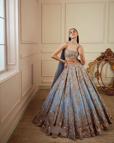 Icy blue with gold embroidered Lehenga set