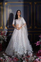 White lehenga with silver embroidery