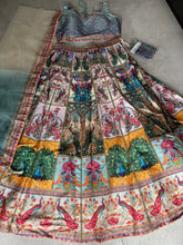 Boutique collection - vibrant peacock stone work Lehenga