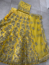 Yellow and silver super soft net lehenga