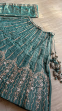 Turquoise chiffon zari embroidered lehenga