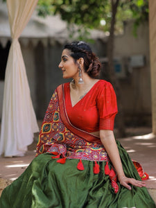 Traditional dola silk twirling lehengas in mehendi green