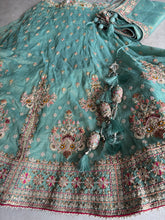 Mint Green Embroidered tissue fabric Lehenga