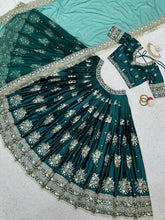 Emerald green and gold motifs lehenga