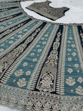 Aqua and dark green panelled Lehenga