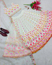 White Lehenga with multi coloured thread work