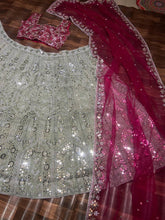 Exquisite diamond silk sage green Lehenga with contrasting colours
