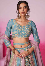 Multicoloured chiffon embroidered panelled turquoise Lehenga