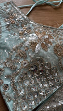 Icy blue lehenga with champagne gold work