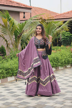 Peanut pink and black flute Chaniya Choli (free hand purse)