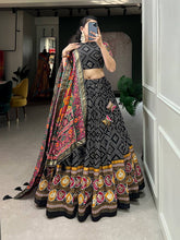 Royal ensemble of bandhej and patola print Lehenga in black