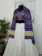 Purple Bandhani and white embroidered Lehenga