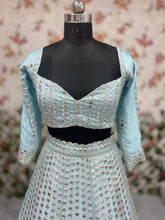 Icy blue Rangoli silk lehenga (pastel)