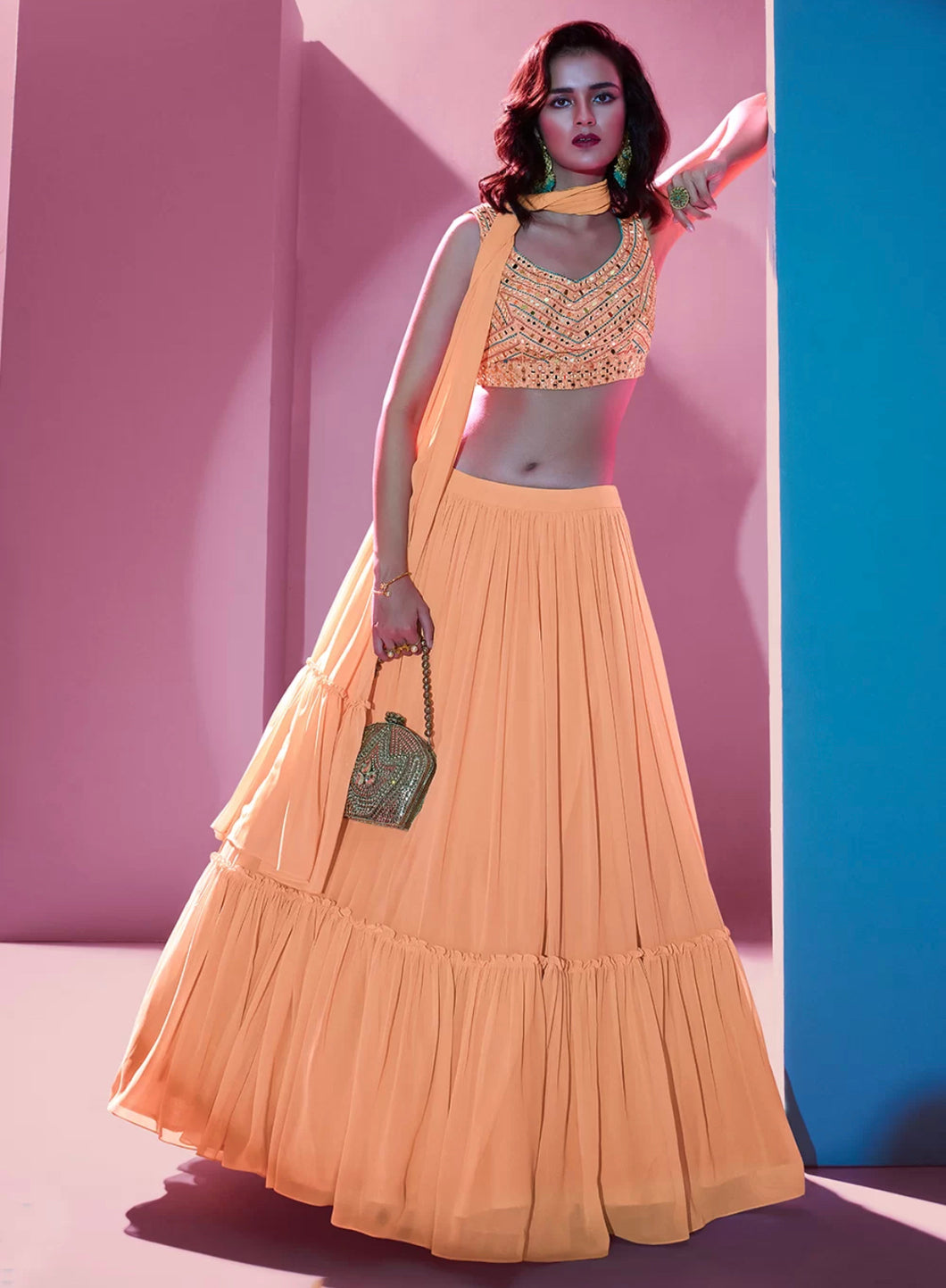 Ariana - pastel orange engagement Lehenga