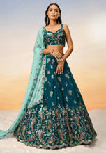 Teal blue embroidered Georgette Lehenga with the sky blue dupatta