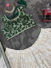 Green and off white jacquard Lehenga