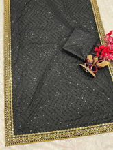 Kriti inspired black and gold sequins saree