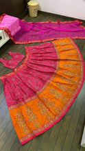 Pink and orange bandhani look Lehenga