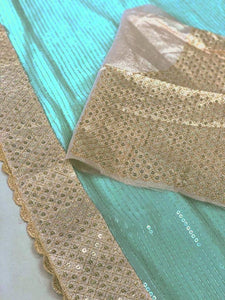 Sea green georgette saree