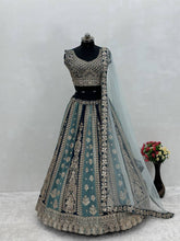 Aqua and dark green panelled Lehenga