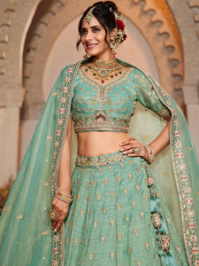Mint Green Embroidered tissue fabric Lehenga