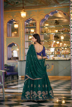 Rangoli silk green and blue contrasting lehenga