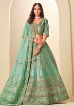 Sea green and gold embroidered art silk Lehenga
