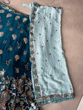 Teal blue embroidered Georgette Lehenga with the sky blue dupatta