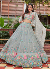 Sage green with a pop of floral colour lehenga