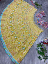 Pastel yellow and baby pink thread work Lehenga