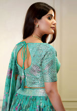 Sea green organza bird and floral print Lehenga