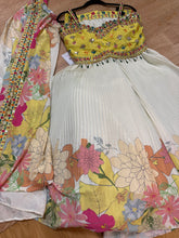 Boutique collection - off white and yellow Lehenga with shrug