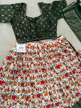 Green Dola silk and patola print Lehenga