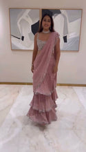 Light pink sequinned layered Lehenga saree