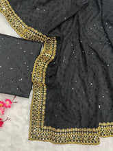 Kriti inspired black and gold sequins saree